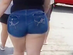 Big bbw ass in booty shorts walking at the car cruise