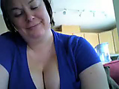 Busty teacher rubs her big soft tits