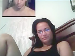 Nerdy girl gets tricked with a fake guy on skype and masturbates