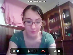 Nerdy girl with glasses masturbates with a toy for her bf on skype