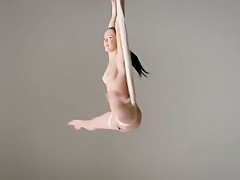 Nude anti-gravity yoga